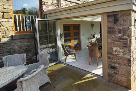 Bifolding doors with large glass panels