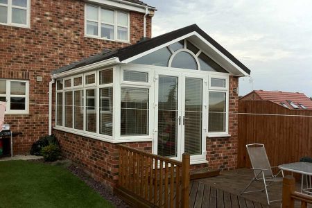 Tiled conservatory installed to replace old plastic conservatory roof