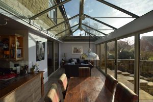 Orangery internal view with glass roof and bifold doors